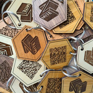 Hexagonal shaped engraved wooden key rings